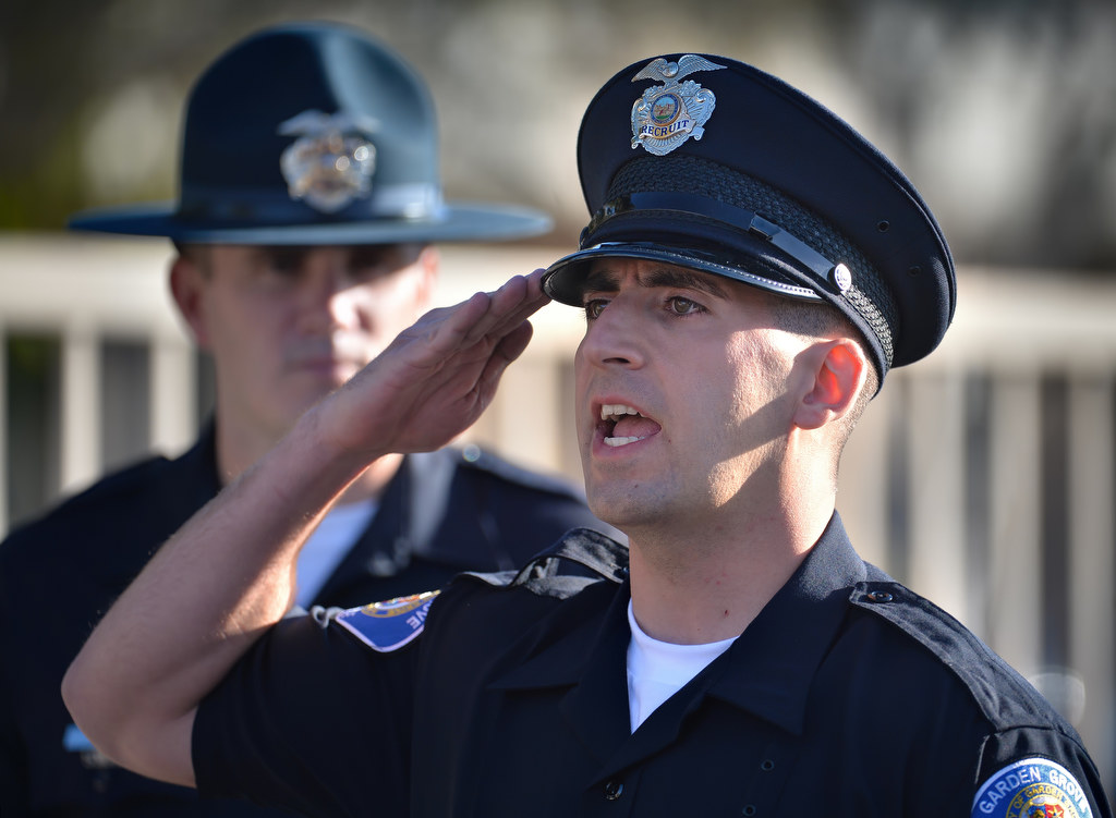 Garden Grove PD Recruit Josh Behzad answers questions military style during a drill session at GGPD headquarters. Photo by Steven Georges/Behind the Badge OC