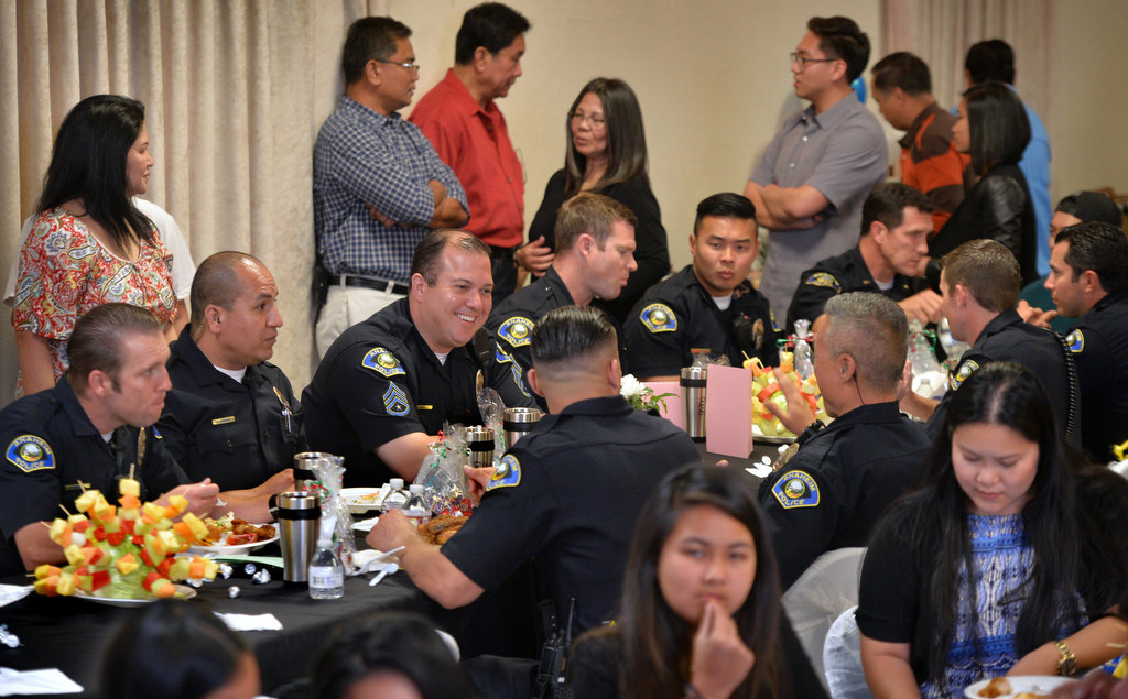 Anaheim PD officers are treated to a meal by the members of Iglesia Ni Cristo (Church of Christ) in Anaheim after the church invited them for Anaheim Law Enforcement Appreciation Day. Photo by Steven Georges/Behind the Badge OC