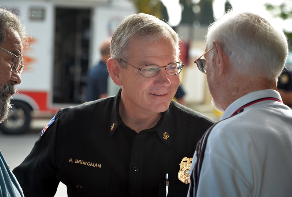 Anaheim Fire & Rescue Chief Randy Bruegman catches up with friends during the department’s annual retiree breakfast. Photo by Steven Georges/Behind the Badge OC