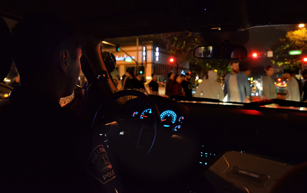 Sgt. Pedram Gharah of Fullerton PD’s ECHO Unit, patrols downtown Fullerton on a Saturday night. Photo by Steven Georges/Behind the Badge OC