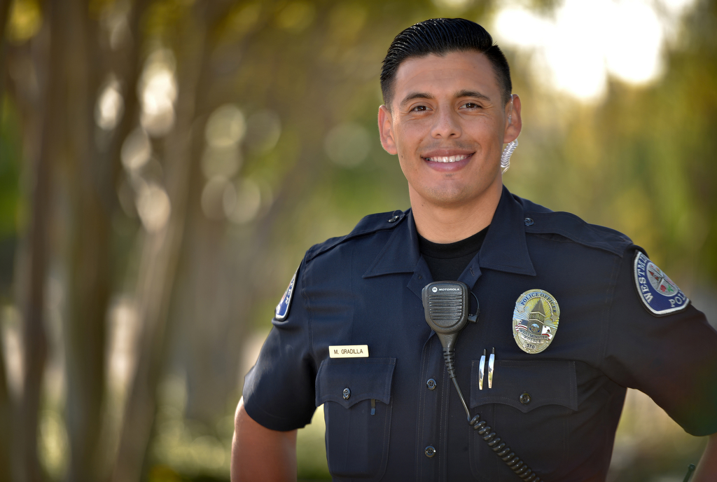 Westminster Officer Mike Gradilla, whose Facebook photo of him and a young boy went viral over the weekend.