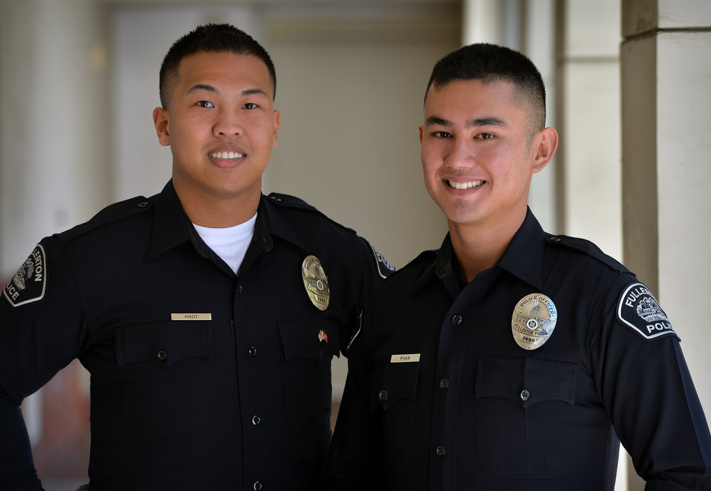 Officers, Bunnath Phot, left, and Long Phan. Two Fullerton PD officers that are also military reservists. Photo by Steven Georges/Behind the Badge OC