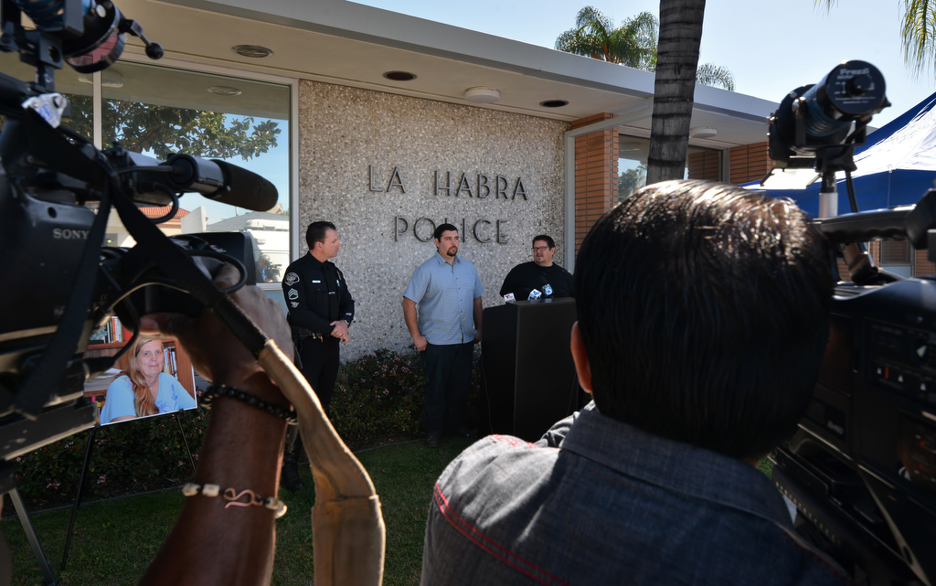 Television news cameras cover a press conference in front of the La Habra Police station announcing a $25,000 reward for information leading to the arrest & conviction of the hit and run driver who killed Linda May Lopez in La Habra on November 13, 2015. Photo by Steven Georges/Behind the Badge OC