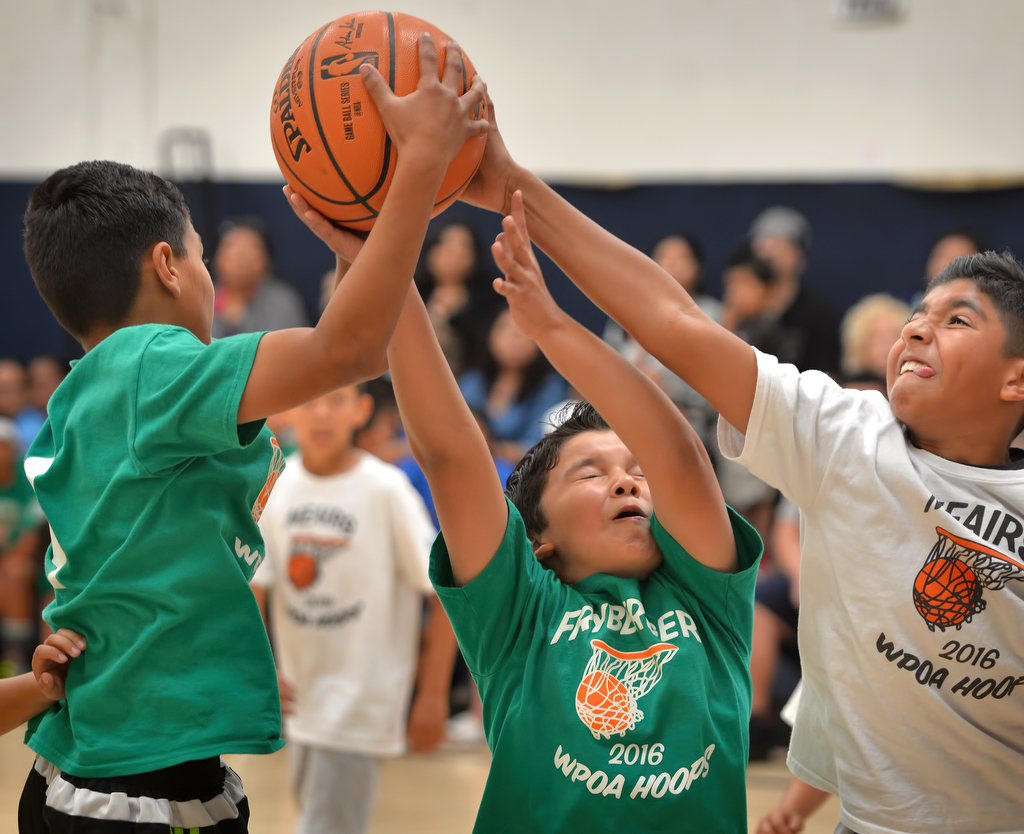 Kids compete in the Hoops Basketball League championship game at the Boys & Girls Club of Westminster sponsored by the Westminster Police Officer's Association. Photo by Steven Georges/Behind the Badge OC