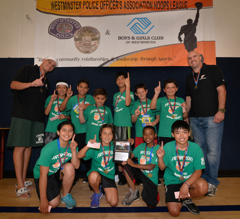 Team Fryberger celebrates their championship win for the WPOA Hoops Basketball League championship game at the Boys & Girls Club of Westminster. Photo by Steven Georges/Behind the Badge OC