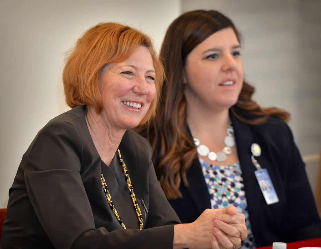 Orange County Sheriff Sandra Hutchens, left, gives her input with OC Sheriff’s Public Affairs Manager Carrie Braun, right, during the Interfaith Advisory Council Meeting held at the Sikh Center of Orange County. Photo by Steven Georges/Behind the Badge OC