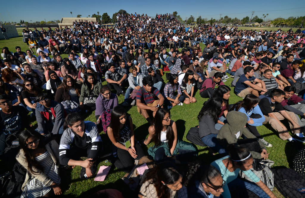 Students from Anaheim High School watch a staged drunk driving accident in front of Anaheim High School, part of the Every 15 Minutes program. Photo by Steven Georges/Behind the Badge OC