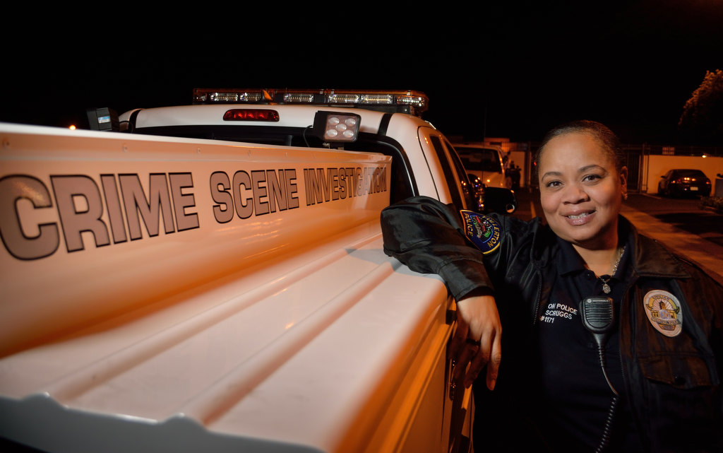 Dawn Scruggs, of the Fullerton PD’s CSI, with the departments Crime Scene Investigation truck. Photo by Steven Georges/Behind the Badge OC