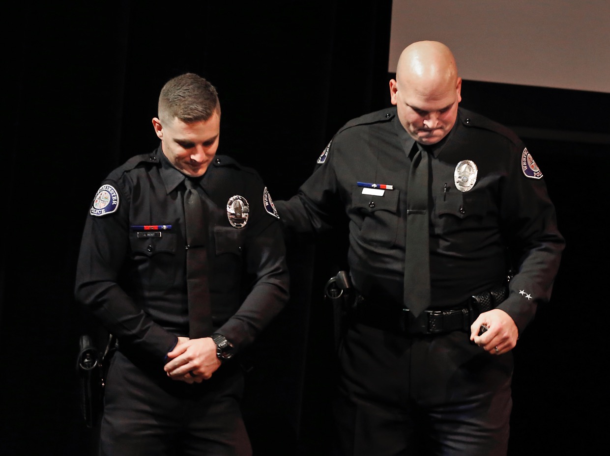 Officers Jerad Kent, left, and Derek Link were honored with a lifesaving award after pulling several people from their vehicles after a major traffic collision. Photo by Christine Cotter/Behind the Badge OC