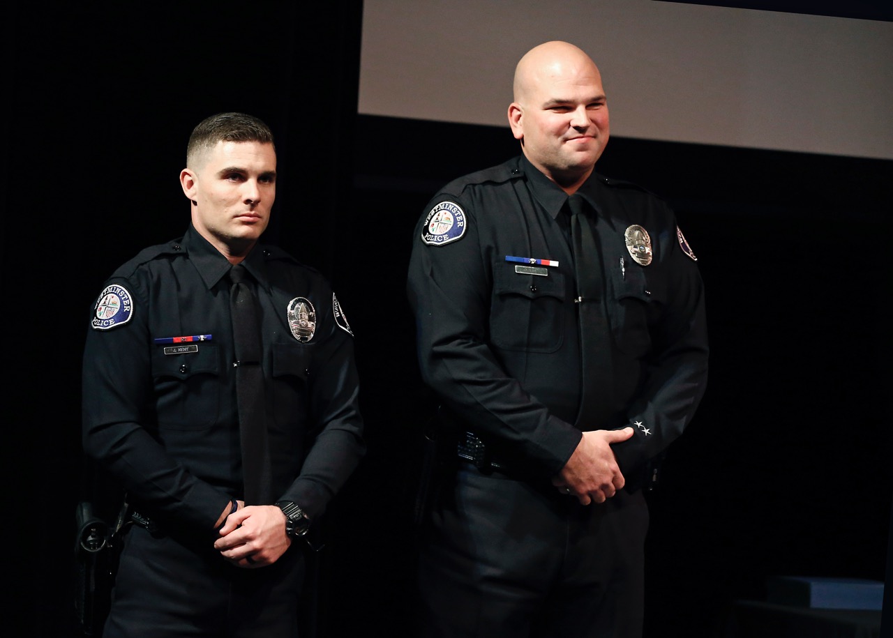 Officers Jerad Kent, left, and Derek Link were awarded the Lifesaving Award after rescuing several people from a serious traffic collision. Photo by Christine Cotter/Behind the Badge OC
