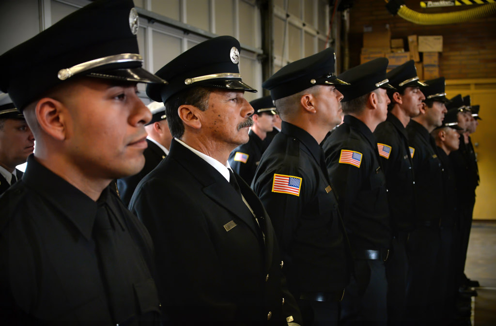 Members of the Fullerton Fire Department being honored line up at the start of the department’s promotional ceremony at Fire Station 1. Photo by Steven Georges/Behind the Badge OC
