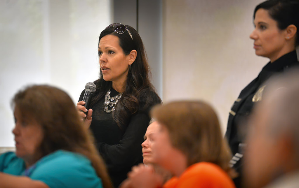 Melisa Blevins, an employee of Beechwood Elementary School in Fullerton, asks questions after an Active Intruder Awareness presentation by Fullerton PD at the Fullerton Community Center. Photo by Steven Georges/Behind the Badge OC