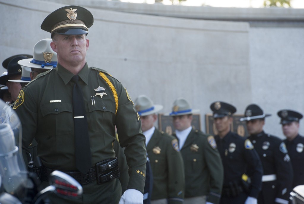 Orange County Sheriffs' Sergeant Scott Steinle stands at attention with other members of the Peace Officers' Memorial Honor Guard during the 2016 Orange County Peace Officers' Memorial Ceremony and Candlelight Vigil held at the OCSD Regional Training Facility.