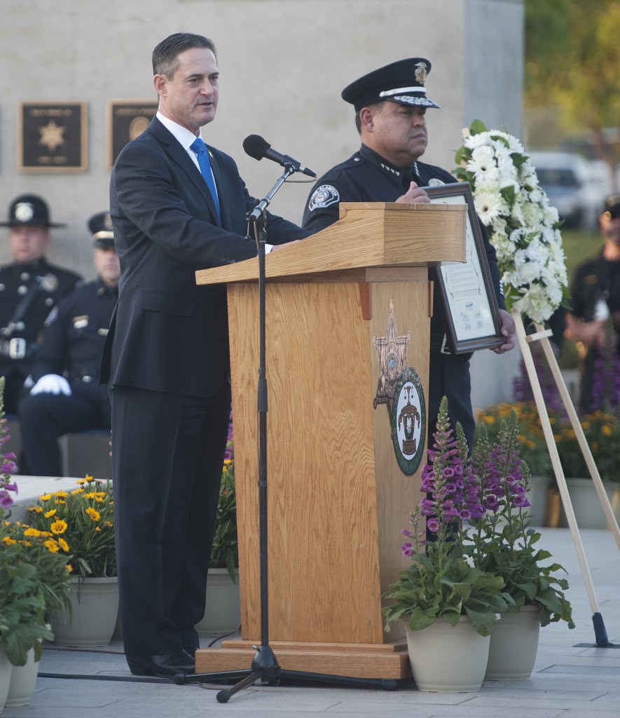 Orange County Supervisor Todd Spitzer makes a presentation during the 2016 Orange County Peace Officers' Memorial Ceremony and Candlelight Vigil held at the OCSD Regional Training Facility.