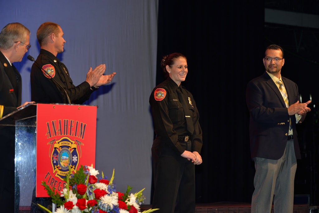 Anaheim Firefighter/Paramedic Heather Soliz, second from left, is congratulated for being honored by VFW Post 3173 as Firefighter of the Year. Captain Tim Sandifer, second from left, was honored with the Ed Bent Training Excellence Award at the California Training Officers’ Fall Training Symposium, given annually to the top firefighting instructor in the state. And Metro Net’s System Administrator, Juan Ordaz, right, received the 2016 IT Technologist of the Year Award presented by the California Public Safety Radio Association. Photo by Steven Georges/Behind the Badge OC