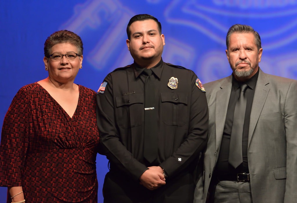 AF&R Metro Net Supervisor Steven Perez with his parents Linda And Richard Perez after receiving his new badge. Photo by Steven Georges/Behind the Badge OC
