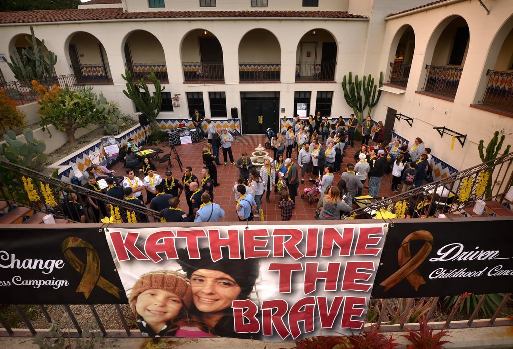 Signs for Katherine King, who was diagnosed with an incurable brain stem tumor, mark the entrance to the Fullerton PD courtyard where people gather for a vigil. Photo by Steven Georges/Behind the Badge OC