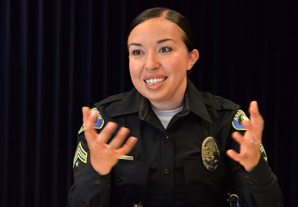 Lucy Sandoval, an Anaheim PD officer who is also tactical negotiator, talks about the rewards of helping people through one of the most stressful moments of their lives. Photo by Steven Georges/Behind the Badge OC