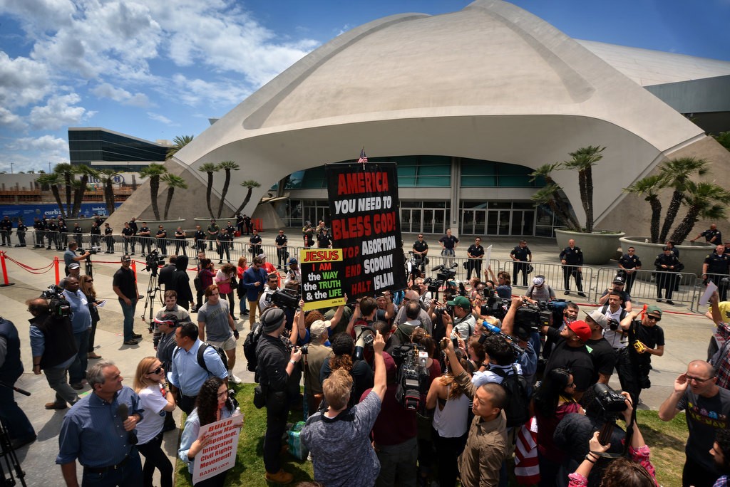 Protesters gather outside the Anaheim Convention Center as presidential candidate Donald Trump holds a rally inside. Photo by Steven Georges/Behind the Badge OC