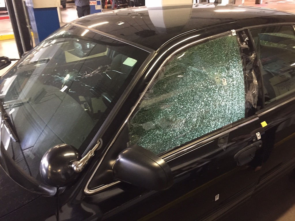 Windows were shattered and windshields blown out in a shooting April 27 when a suicidal man opened fire on deputies. Nobody was injured in the incident and the deputies took the suspects into custody. Photo courtesy the Orange County Sheriff's Department. 