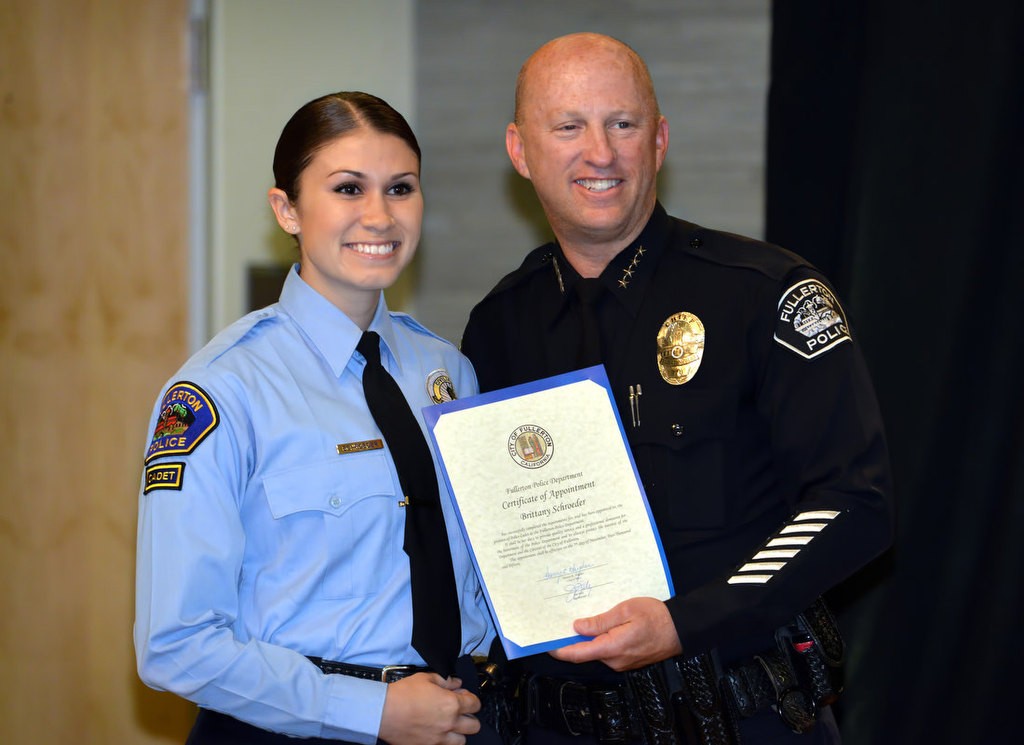 Brittany Schroeder with Chief Dan Hughes as she is recognized for joining the FPD Cadet program. Photo by Steven Georges/Behind the Badge OC