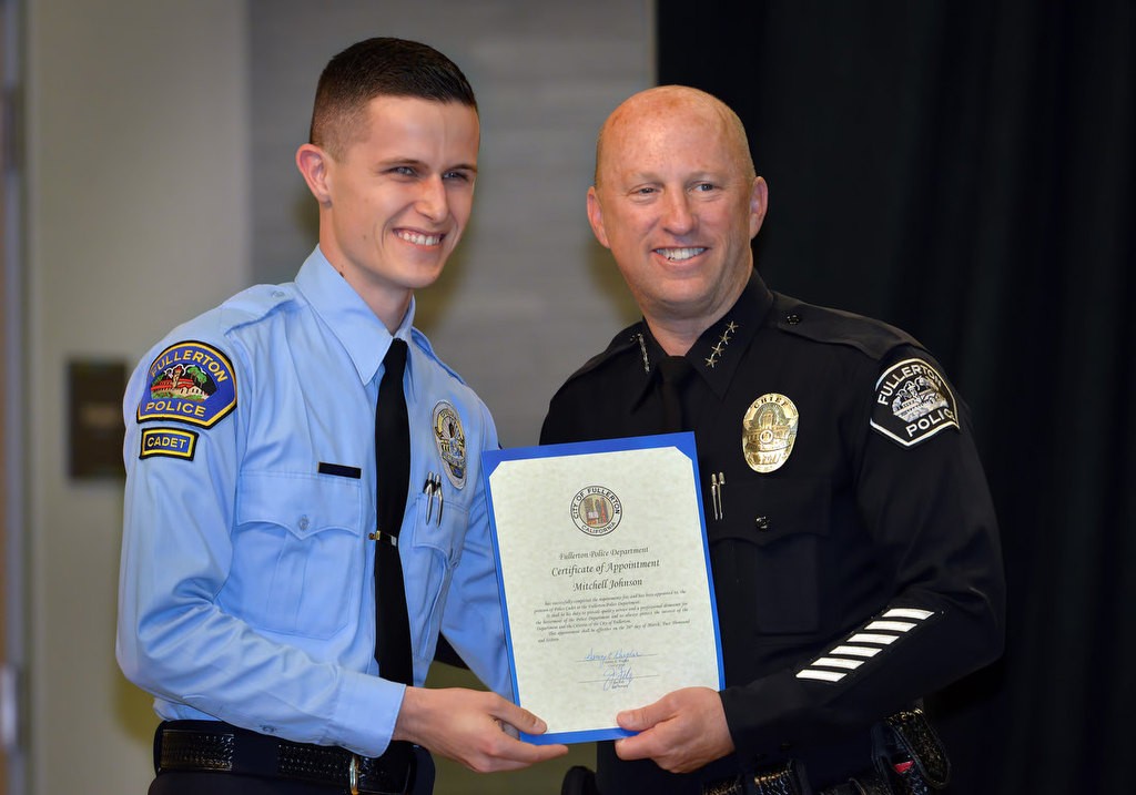 Mitchell Johnson with Chief Dan Hughes as he is recognized for joining the FPD Cadet program. Photo by Steven Georges/Behind the Badge OC