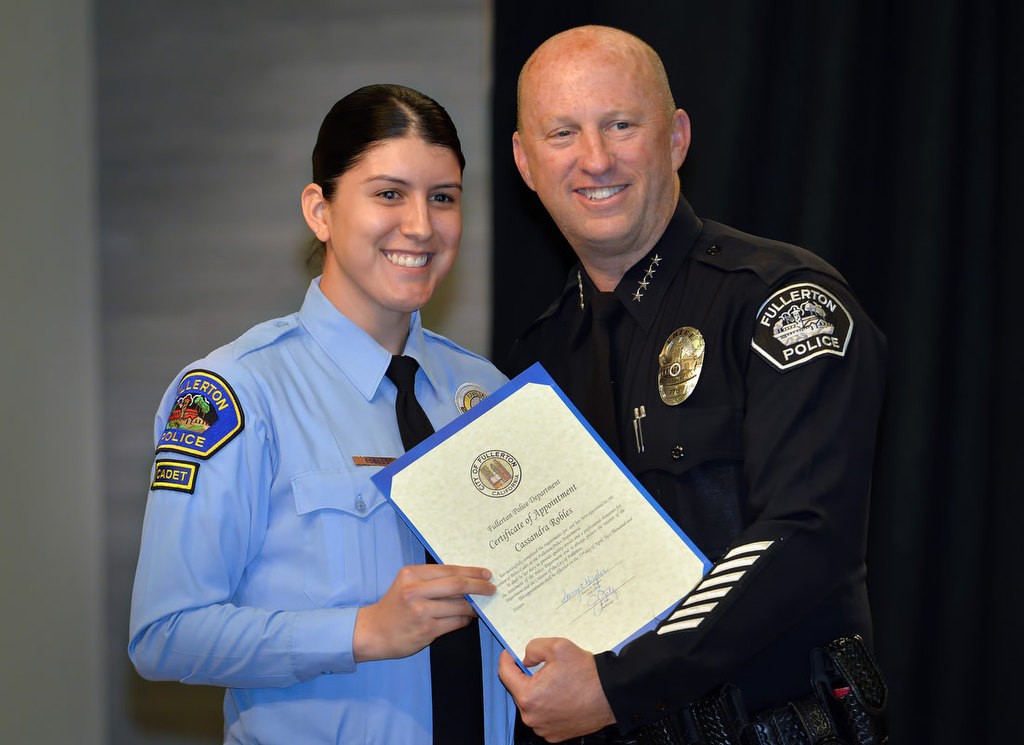 Cassandra Robles with Chief Dan Hughes as she is recognized for joining the FPD Cadet program. Photo by Steven Georges/Behind the Badge OC