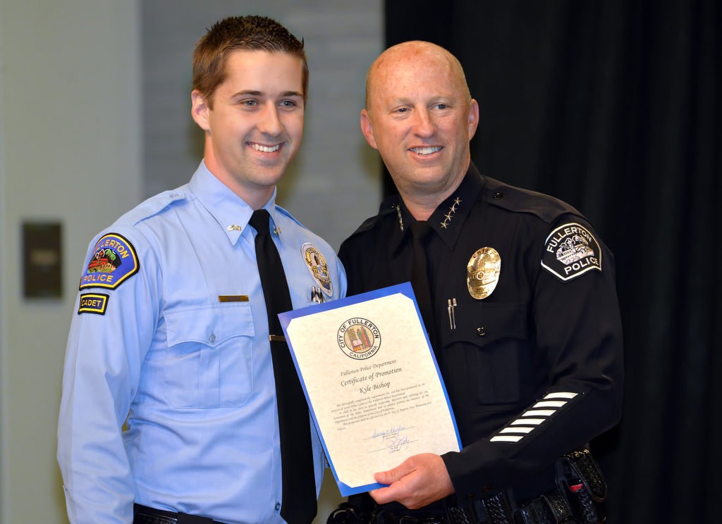 Kyle Bishop with Chief Dan Hughes as he is promoted to the rank of Senior Police Cadet. Photo by Steven Georges/Behind the Badge OCz