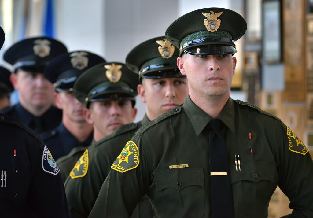 Orange County Sheriff Department graduate Steven Gibson, front right, lines up with his class before entering the Orange County Sheriff's Regional Training AcademyÕs Class of 220 graduation ceremony. Photo by Steven Georges/Behind the Badge OC