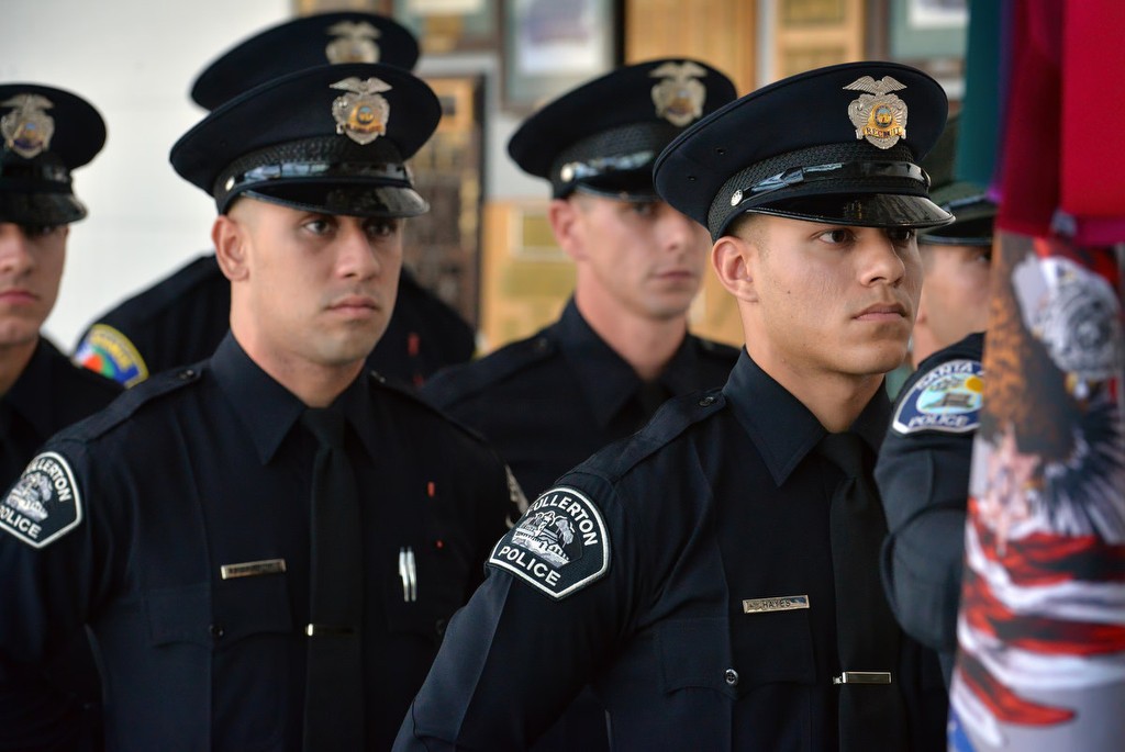 Fullerton PD graduates, Jonathan Alvaradejo, left, and Lawrence Hayes line up before entering the Orange County Sheriff's Regional Training AcademyÕs Class of 220 graduation ceremony. Photo by Steven Georges/Behind the Badge OC