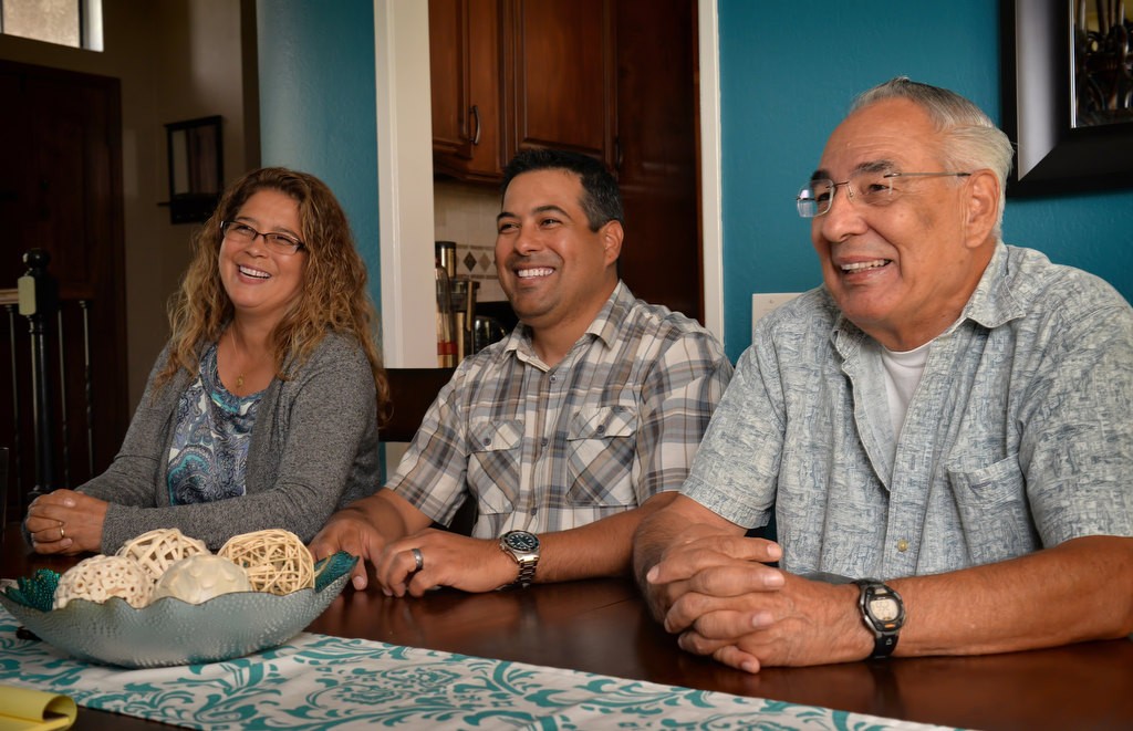 Ron Reyes, retired from the Orange County Sheriff Department, right, talks about his career in law enforcement with two of his kids, Roberta Granek, Litenant Los Angeles Sheriff Department, left, and Paul Reyes, Carlsbad PD. Photo by Steven Georges/Behind the Badge OC