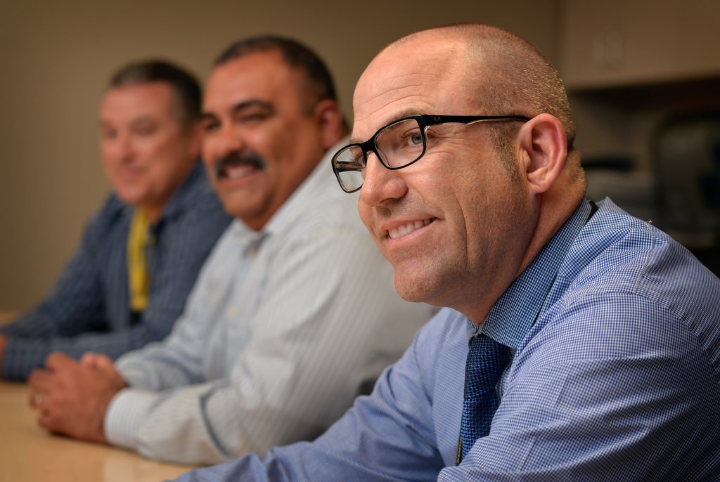 Sgt. Todd Russ of the OCSD, right. Behind him is Deputy Scott Ferraro, left, and Deputy Alejandro Salceda. Photo by Steven Georges/Behind the Badge OC