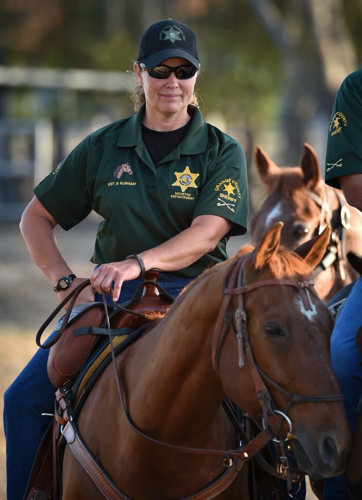 OCSD Sgt. Dee Dee Kurimay of the Mounted Enforcement Unit with Joe, her 16-year-old Quarter Horse. Photo by Steven Georges/Behind the Badge OC