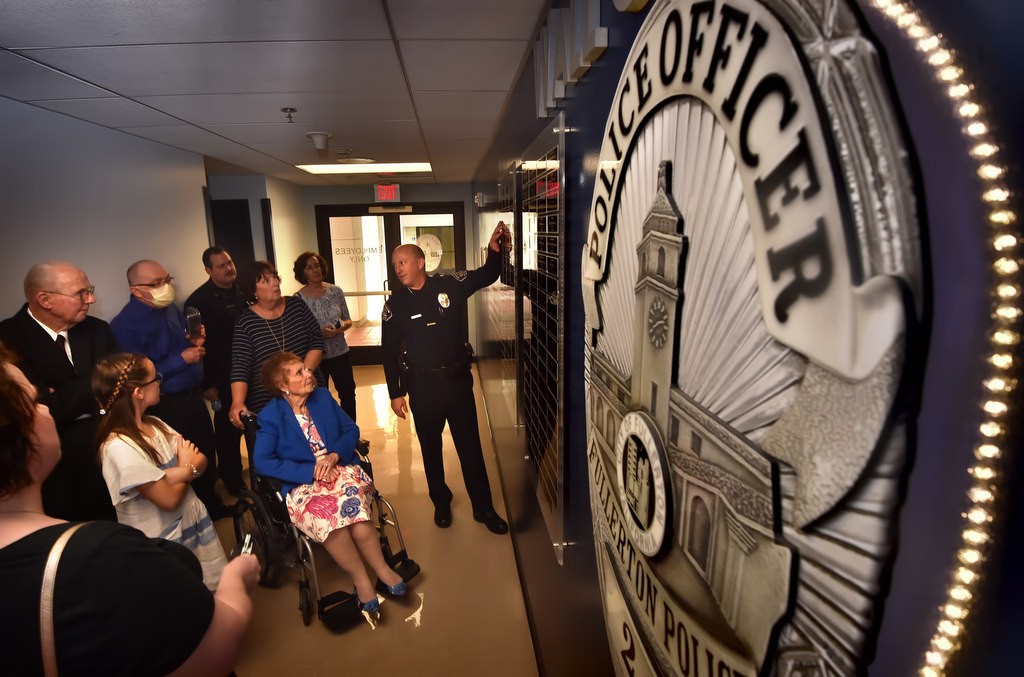 Fullerton PD Chief Dan Hughes gives a tour of police headquarters to family members and friends of Officer Jerry Hatch, the first Fullerton PD officer to be killed in the line of duty. Photo by Steven Georges/Behind the Badge OC