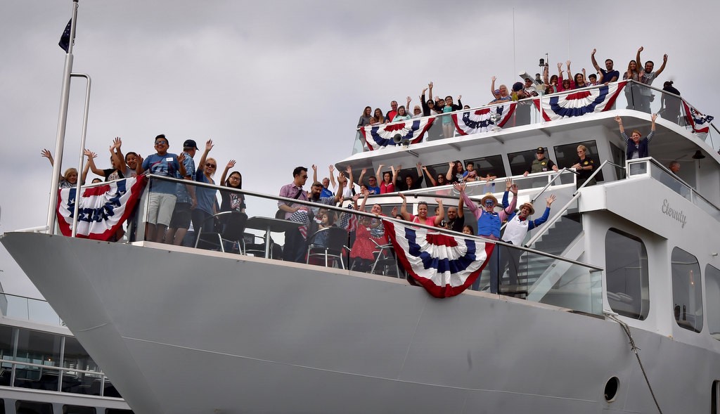 Make-A-Wish families wave from the Electra Cruises boat Eternity at the start of their 4th of July Newport Harbor Cruise hosted by the Orange County Sheriff’s Department. Photo by Steven Georges/Behind the Badge OC