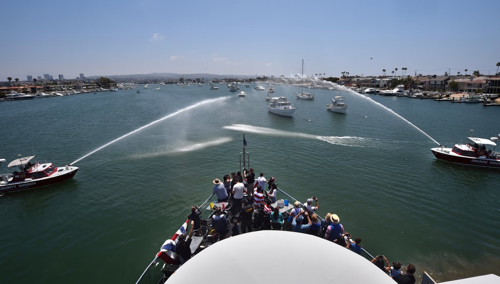 Orange County Sheriff Fire Boats entertain Make-a-Wish kids on board the Electra Cruises boat Eternity during a 4th of July Newport Harbor Cruise. Photo by Steven Georges/Behind the Badge OC