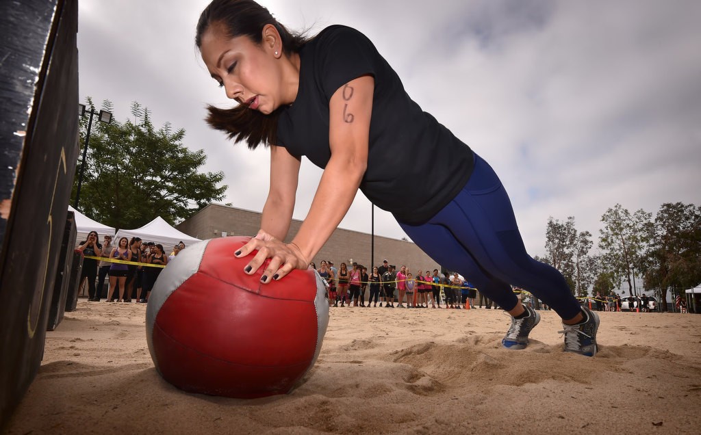 Anaheim PD Officer Leslie Vargas during timed competition for the OCSD Women’s Fitness Challenge benefiting Project 999. Photo by Steven Georges/Behind the Badge OC