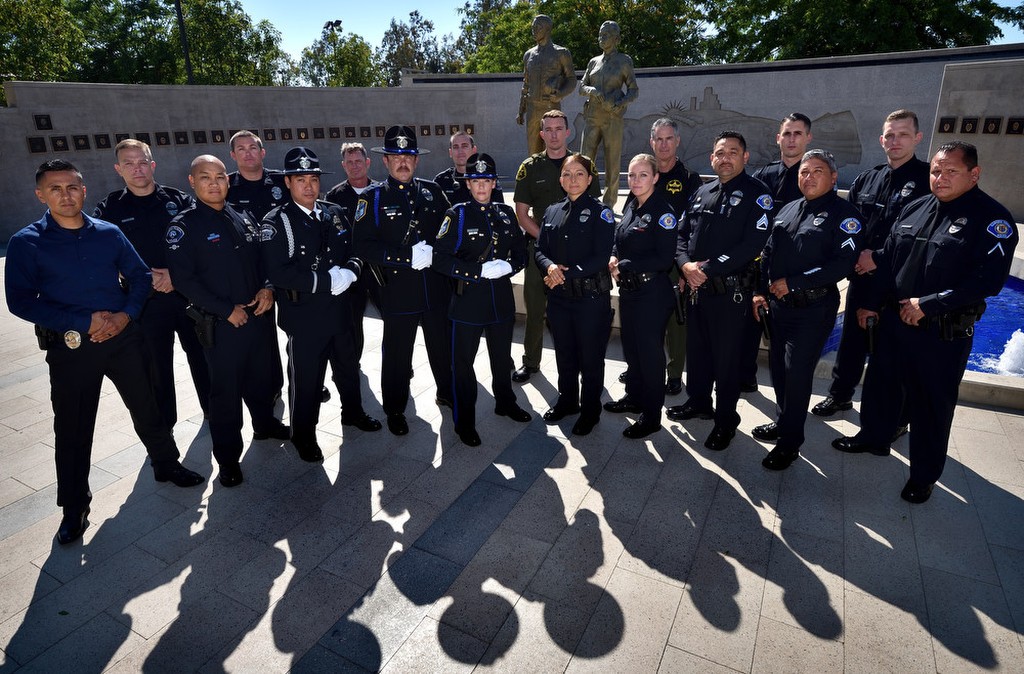 Law enforcement officers from Orange County who attend  funeral services for the five officers killed in Dallas gather at Orange County Peace Officers’ Memorial in Tustin. Photo by Steven Georges, Behind the Badge OC. 
