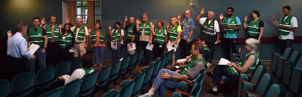 Tustin PD Deputy Chief Paul Garaven swears in CERT volunteers during a meeting at Tustin’s Civic Center. Photo by Steven Georges/Behind the Badge OC