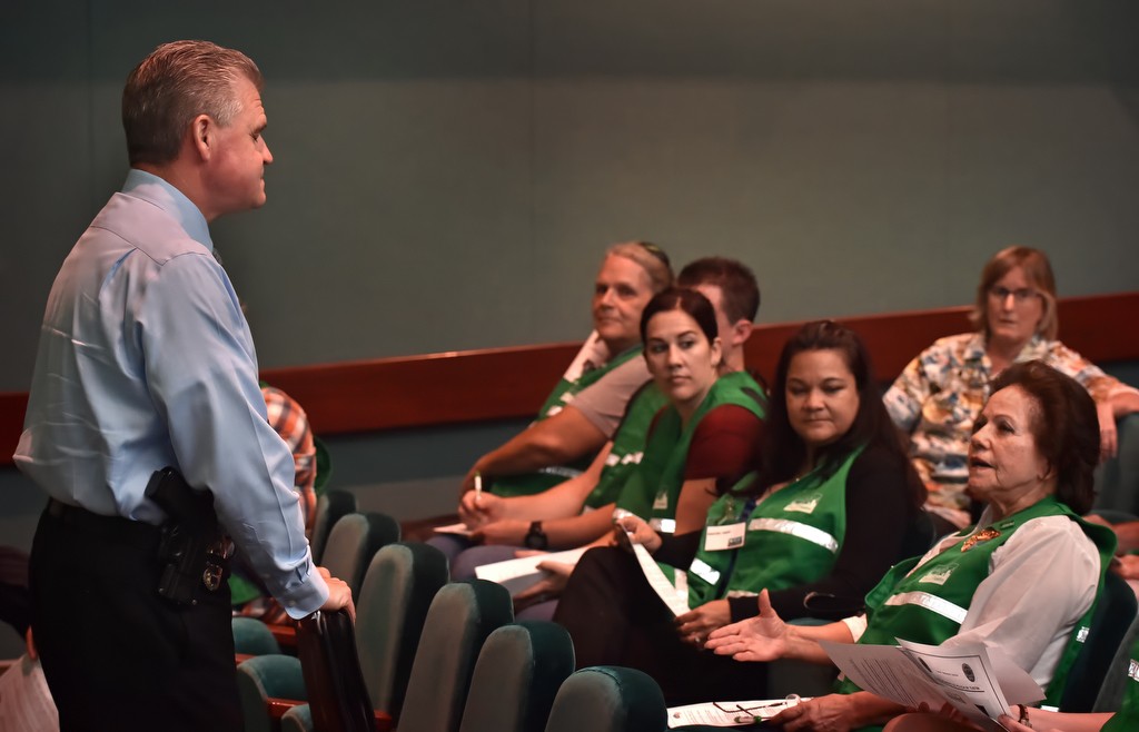 Tustin Police Deputy Chief Paul Garaven talks to CERT volunteers before a swearing ceremony. Photo by Steven Georges/Behind the Badge OC