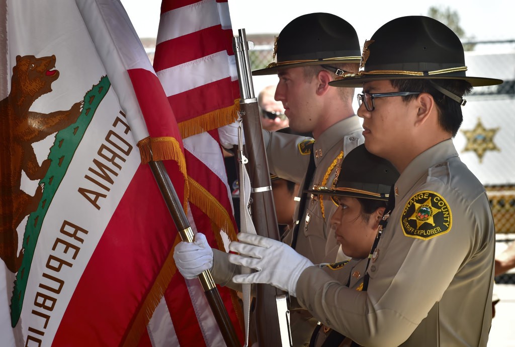 The OC Sheriff Explorer Color Guard posts the colors at the start of the Push 22 ceremony for the final twenty two pushups. Photo by Steven Georges/Behind the Badge OC