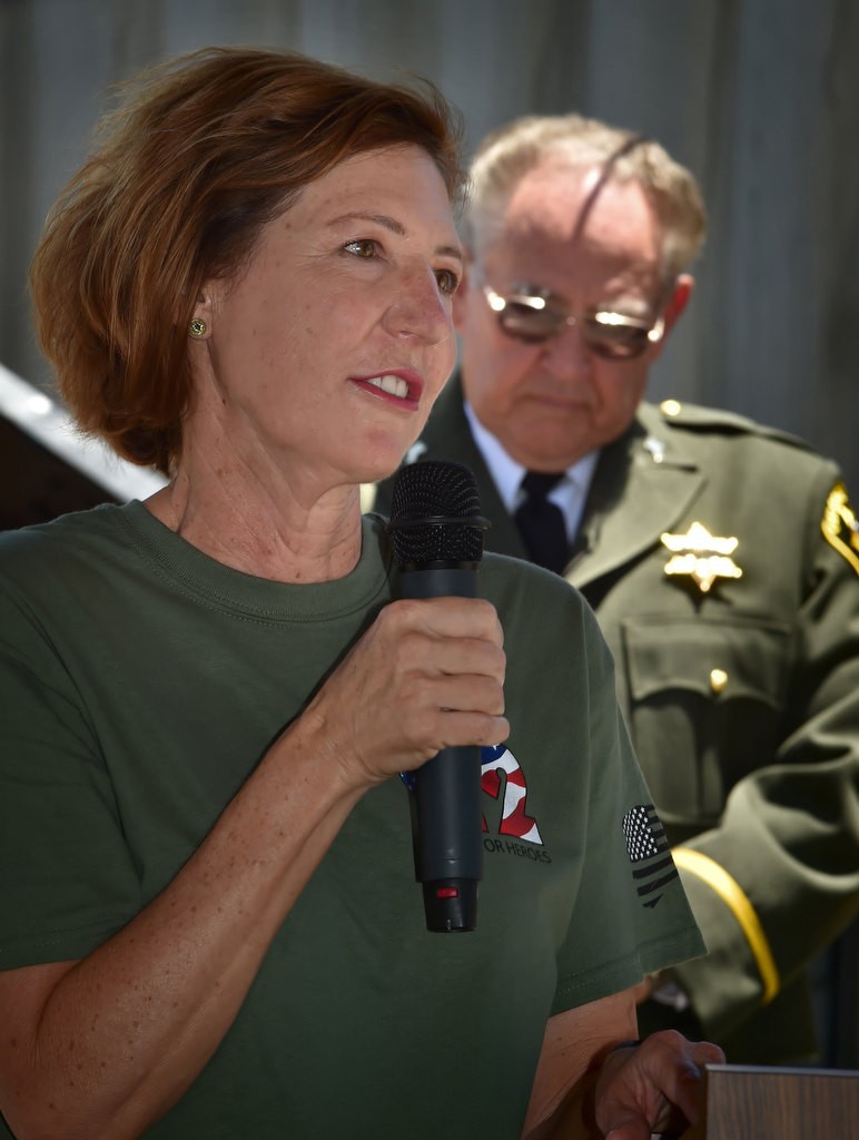 Orange County Sheriff Sandra Hutchens talks to the deputies who have been performing 22 pushups every hour for the past 22 hours to raise awareness for the 22 veterans who, on average, commit suicide each day. The gathering at the Theo Lacy Facility was for the final twenty two pushups. Photo by Steven Georges/Behind the Badge OC