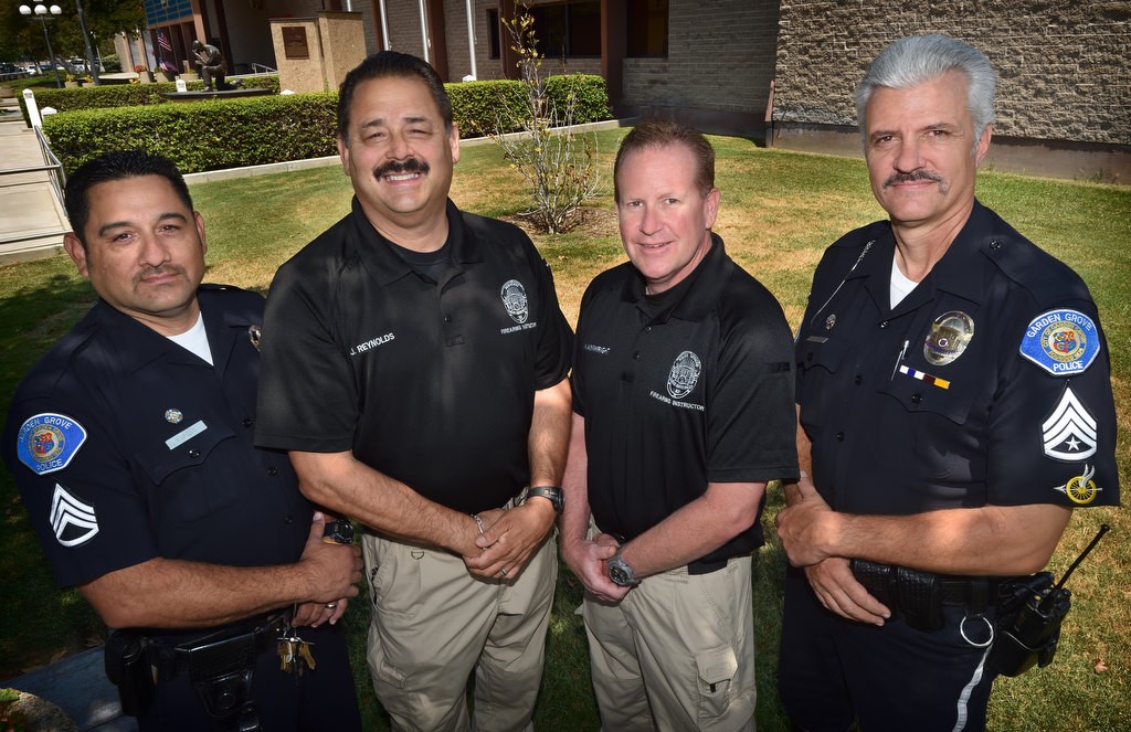 Garden Grove PD Range Masters Sgt. Rich Burillo, left, Sgt. John Reynolds, Sgt. Jon Wainwrigh and Sgt. Jim Fischer. Photo by Steven Georges/Behind the Badge OC