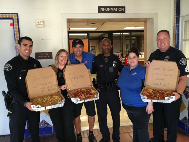 Employees from Domino's Pizza dropped of several pizzas and notes of appreciation to officers in Fullerton. Photo courtesy Fullerton PD. 