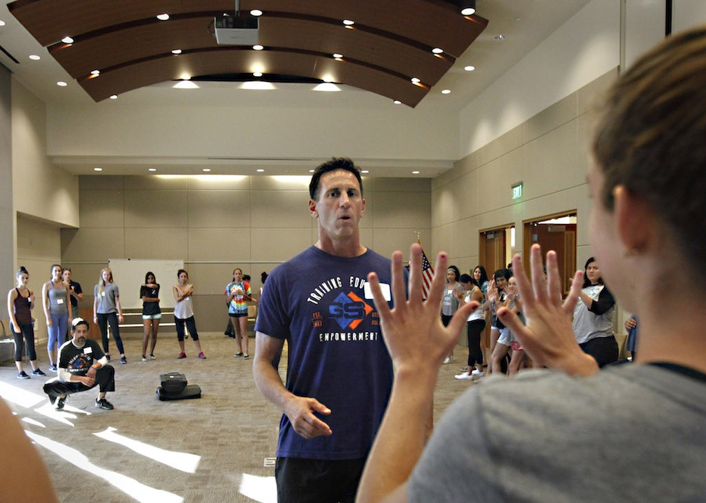 GET SAFE instructor Stuart Haskin instructs young women and teens during a self-defense class at Laguna Niguel City Hall.  Photo by Christine Cotter/Behind the Badge OC. 