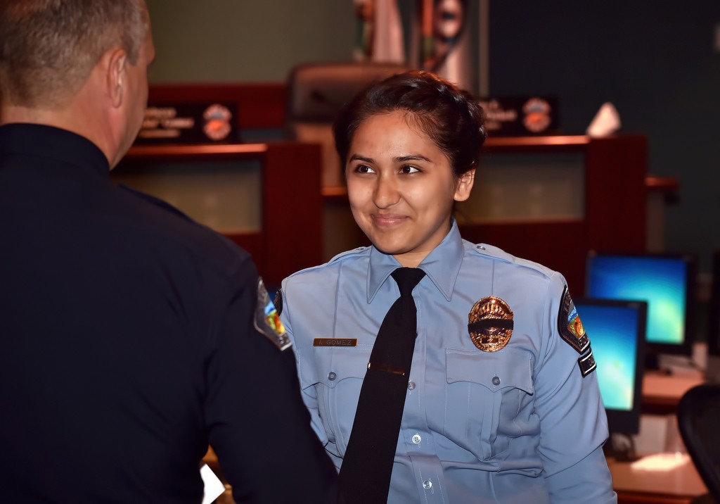 Tustin PD Cadet Itzel Gomez is greeted by Tustin Police Chief Charles Celano during a promotions ceremony. Gomez plans on attending the police academy once she graduates from UCI. Photo by Steven Georges/Behind the Badge OC