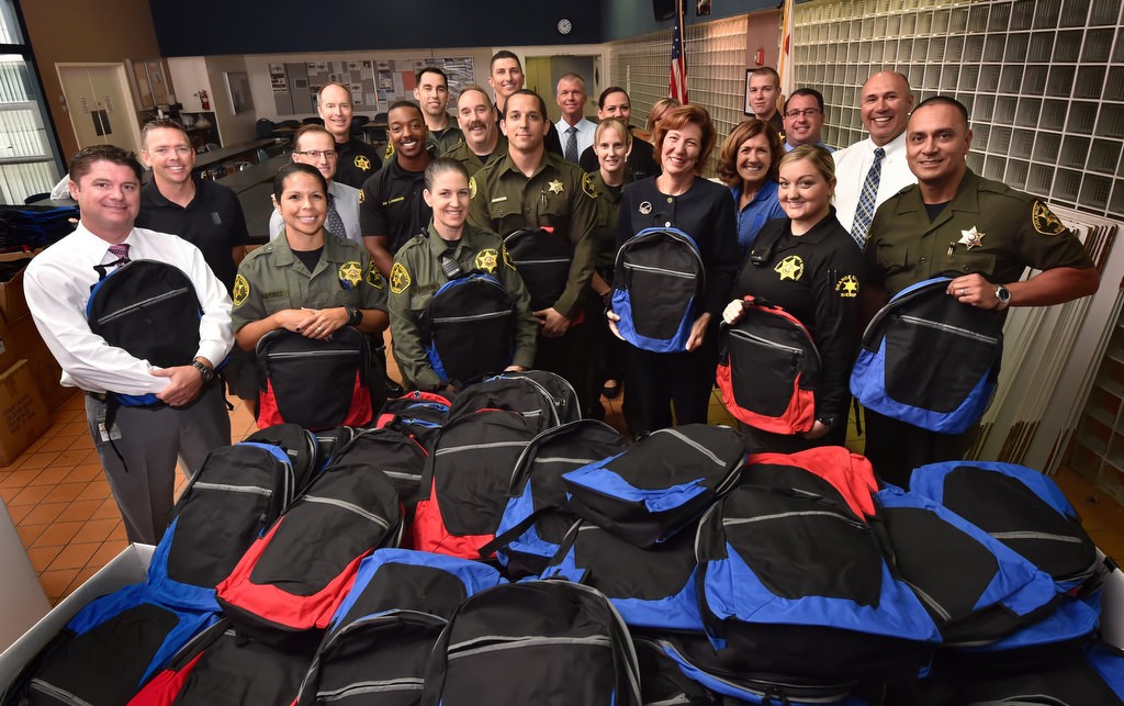 Orange County Sheriff deputies and employees volunteer their time to assemble backpacks with school supplies for kids in need, part of the OCSD’s Six Points For Kids (SPFK) program. Photo by Steven Georges/Behind the Badge OC