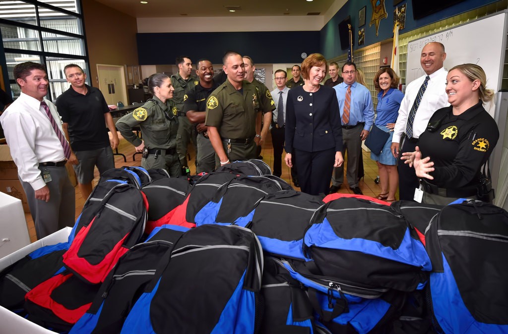 Orange County Sheriff deputies and employees volunteer their time to assemble backpacks with school supplies for kids in need, part of the OCSD’s Six Points For Kids (SPFK) program. Photo by Steven Georges/Behind the Badge OC