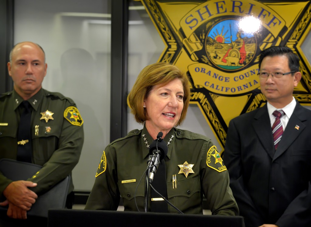 Orange County Sheriff Sandra Hutchens talks about the improved security measures at the Central Men’s Jail (CMJ) after three inmates escaped from the jail in January 2016. Behind her is Assistant Sheriff Steve Kea, left, and Orange County Supervisor Andrew Do. Photo by Steven Georges/Behind the Badge OC