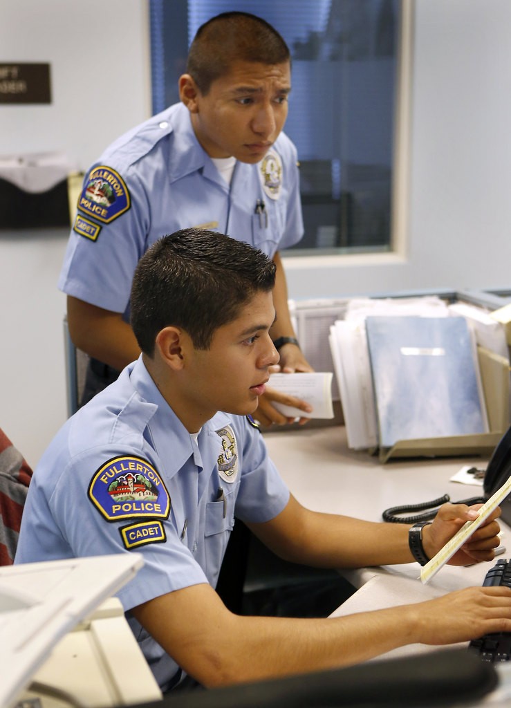 Christopher Antonio (top) and Marcos Soria are both enrolled in the Fullerton Police Cadet program.  Photo by Christine Cotter